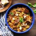 Slow-Cooked Lamb with Orzo and Basil Garnish